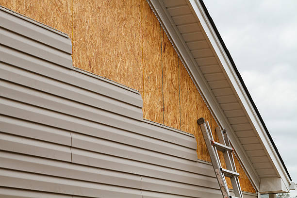 Professional Storm Damage Siding Repair technician working in North Carolina, NC